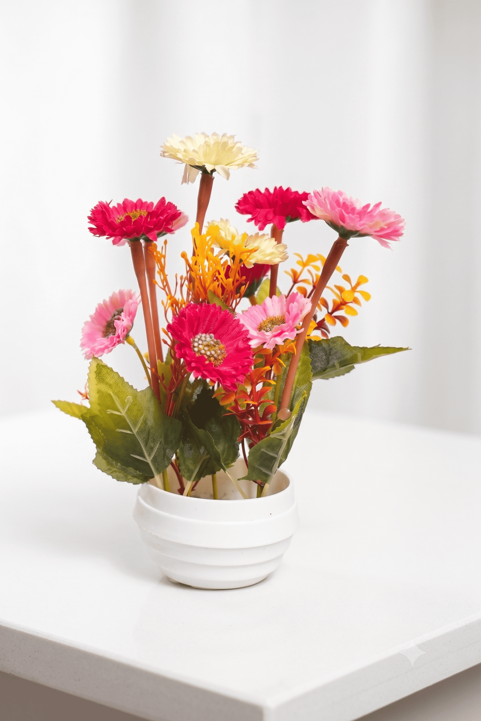 artificial red pink yellow flower with white pot